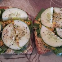 Cucumber and lemon pepper-topped open-faced sandwiches
